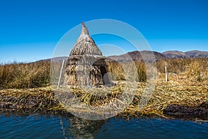 Totora reed huts on a manmade floating island, Lake Titicaca, Pe photo