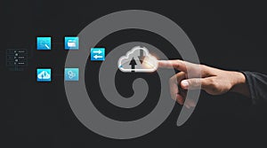 The businessman& x27;s finger points to the cloud icon