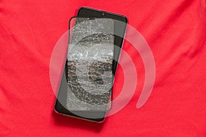 Touch mobile phone and broken tempered glass on an isolated background, glass replacement