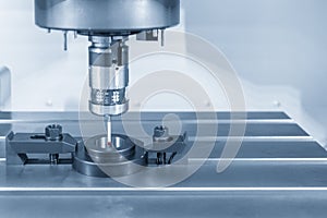 The touch probe attach on the CNC milling machine for calibration process with ring gage.