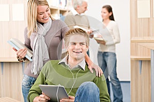 Touch screen tablet computer - students in library