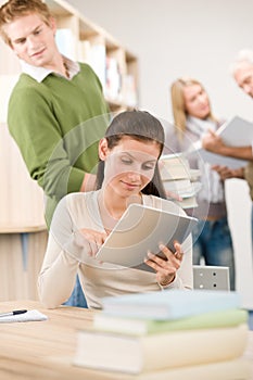 Touch screen tablet computer - students in library