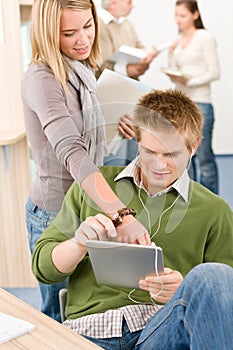 Touch screen tablet computer - students in library