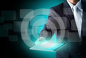 Touch screen tablet in hands business man