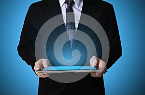Touch- tablet in hands Business man
