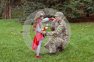 A touching meeting of a Ukrainian little girl with her military father