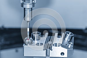 The touching probe attach on CNC machine calibration process.