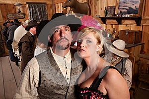 Tough Cowboy and Showgirl in Saloon