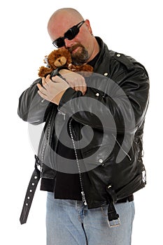 Tough guy with a teddy bear