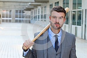 Tough looking male holding baseball bat