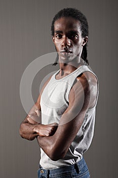 Tough young black man bicep and shoulder muscles