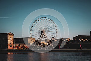 The Toulouse Ferris wheel submerging the Garonne