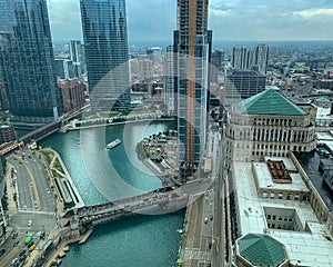 Tour boat crossing the Chicago River during a foggy afternoon