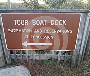 tour boat dock sign information and reservations photo
