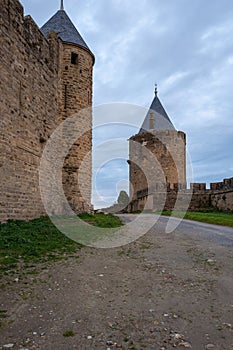 Tour de la Vade, a tower in the CitÃ© of Carcassonne, the fortified city of Carcassonne at sunset, Aude, Occitanie region, France