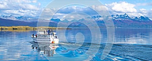 Tour ship sailing at beagle channel, ushuaia, argentina