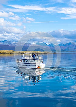 Tour ship sailing at beagle channel, ushuaia, argentina