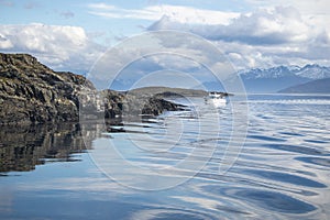 Tour ship sailing at beagle channel, ushuaia, argentina