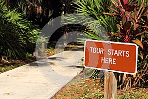 Tour Starts Here Sign