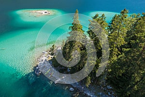 Touring Kayaks on a Rocky Lake Shore Aerial View