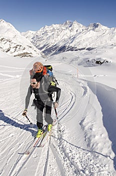 Touring skier in Swiss Alps