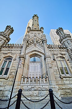 Tourism chains around Chicago water tower entrance to historic original castle building