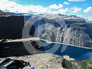 Tourism concept View of Trolltunga cliff. The Troll`s tongue Odda, Norway