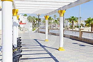Tourism in spain. Maritime promenade in Rota, Cadiz, Spain. photo