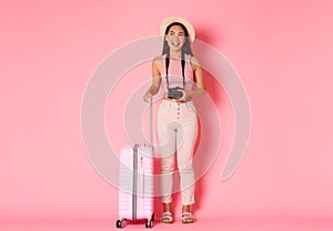 Tourism, summer vacation, holidays abroad concept. Full length of happy attractive asian girl tourist, traveller in