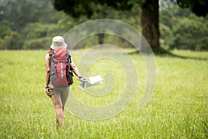 Tourism and traveler woman backpack travel and explore adventure in nature.