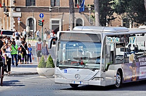 Tourist aboard a sightseeing tour bus in Rome, Italy.