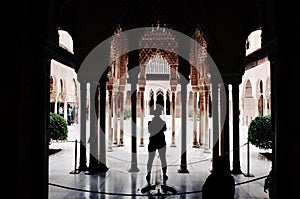 Tourist in Alhambra Palace, Granada, Spain