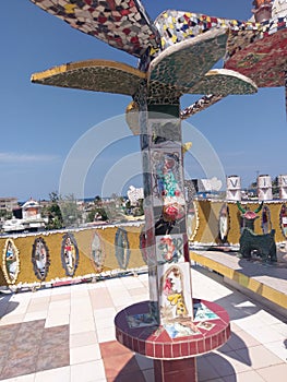 tourist attraction, amusement park, outdoor structure, tourism, recreation, monument, totem pole