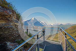 Tourist attraction cliff walk with curve, Grindelwald First, switzerland