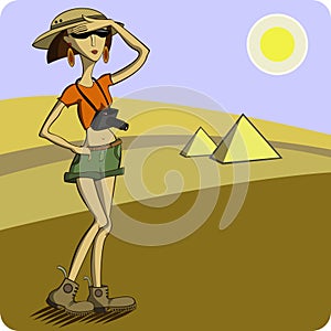 Tourist on the background of the desert and pyrami