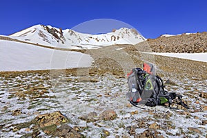 Tourist backpacks are located at the foot of the mountain Erciyes photo