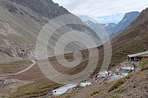 Tourist bathing in the Thermal water pools at Termas Valle de Colina, CajÃÂ³n del Maipo, a popular tourist destination in Chile, photo