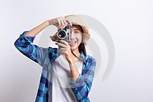 Tourist Beautiful of Asian woman holding a film camera  and smiling  on white background, Asia girl wear Plaid shirt and photo
