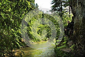 A tourist in the beautiful gorges of the Slovak Paradise National Park