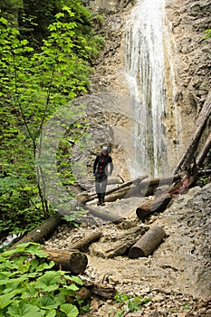 A tourist in the beautiful gorges of the Slovak Paradise National Park