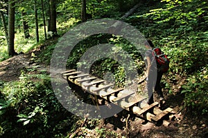 A tourist in the beautiful gorges of the Slovak Paradise National Park