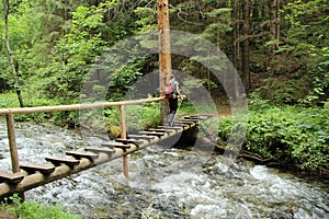 A tourist in the beautiful gorges of the Slovak Paradise National Park