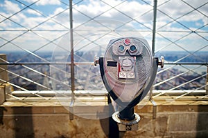 Tourist binoculars at the top of the Empire State Building in New York