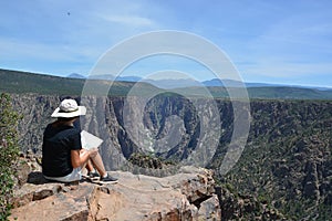 Tourist in the black canyon of the gunnison national park