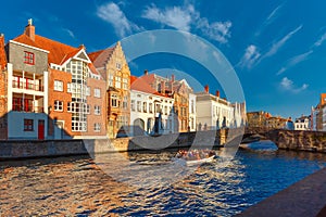 Tourist boat on Bruges canal Spiegelrei, Belgium