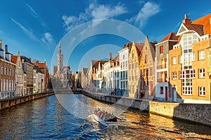 Tourist boat on canal Spiegelrei, Bruges, Belgium