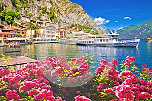 Tourist boat in Limone sul Garda picturesque harbor