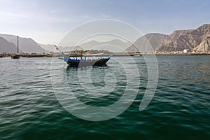 Tourist boat, mountain fjord sea view, Khasab, Oman
