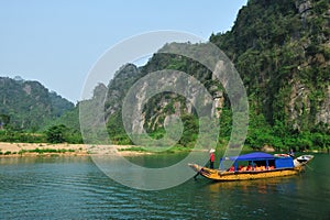 Tourist boat tour at Phong Nha Ke Bang National Park in Vietnam