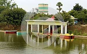 Tourist boating house in the lake at sittanavasal cave temple complex.